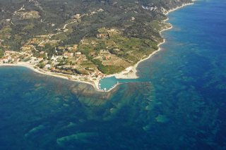 agios-stefanos-to-diaplo-mathraki-aspri-ammos-calypsos-cave-othoni-1